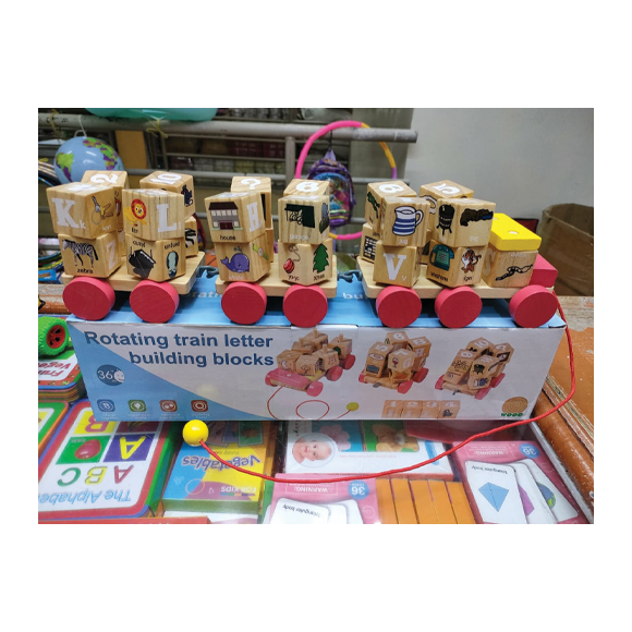 Rotating train letter building blocks